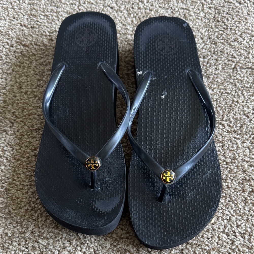 Tory Burch Black Flip Flop Sandals with Gold Logo Medallions